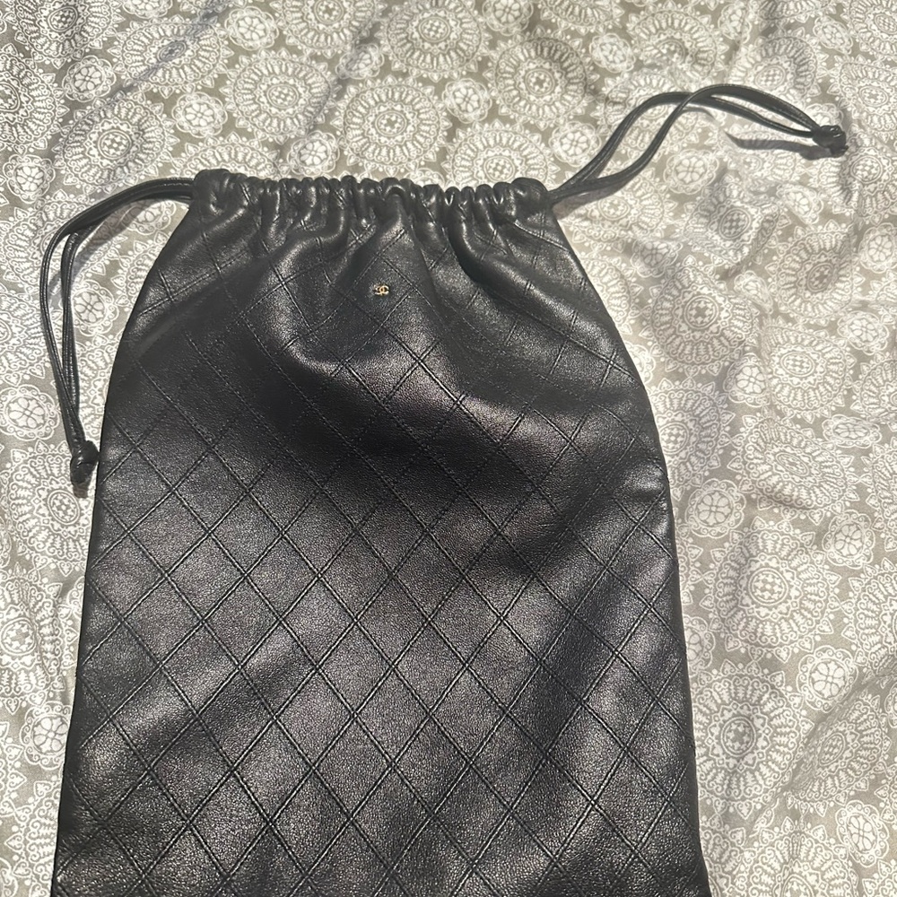 CHANEL Black Quilted Drawstring Bag
